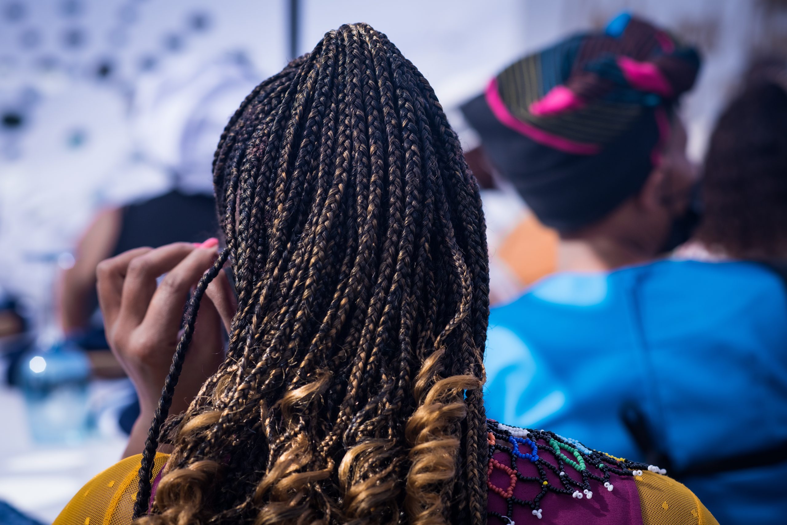 High school teen in Henry County with fresh knotless braids styled by Beauty with Braids in McDonough GA near Jonesboro Rd